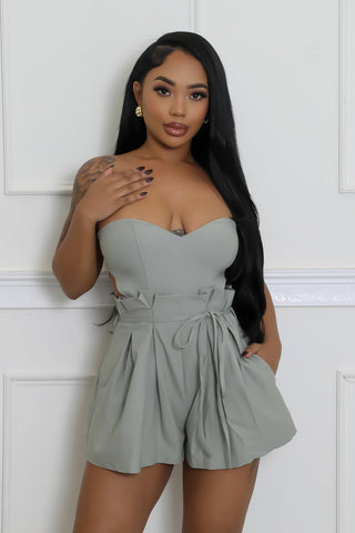 In Her Feminine Romper